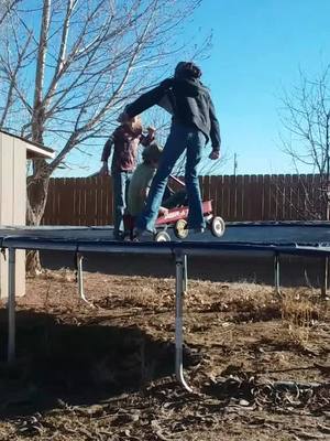 A post by @injailbeoutsoon on TikTok caption: my 3 younger siblings lol #funny #mysiblings #wagon #trapoline