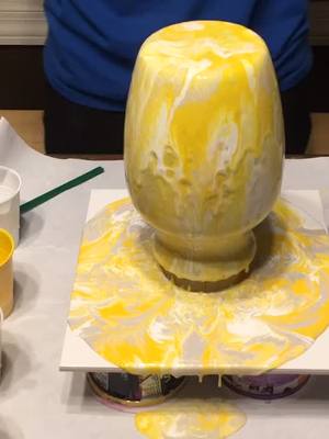 A post by @frontrow.artstudio on TikTok caption: Sunshine vase #foryoupage #artist #satisfying #fluidart #aesthetic #featureme #sunshine #yellow