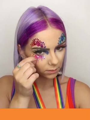 A post by @hair_satisfying on TikTok caption: Rainbow pride makeup tutorial🌈Nobody should be judged for who they fall in love with💕#Pride 🏳️‍🌈