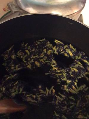 A post by @macabremeg on TikTok caption: Making Butterfly Pea flower tea. 💙 #witchcraft #butterflypeaflower #bluetea #foryou