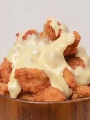 A post by @memesmalaysia on TikTok caption: You may love this cheesy chicken!🍗