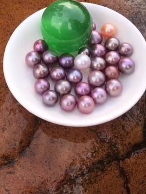 A post by @safinyao on TikTok caption: green ball and round pearls#pearl #pearls #mussel #oyster