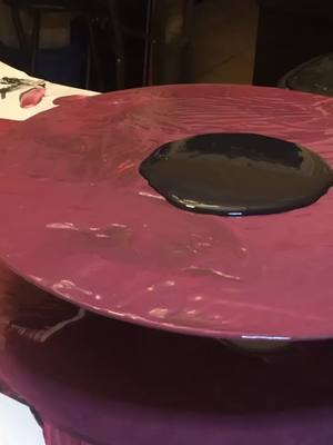 A post by @frontrow.artstudio on TikTok caption: Beautiful rose colors on a record! #makeitawesome #fluidart #artist #rose #foryourpage #artist #record #painting