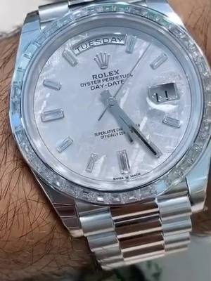 A post by @luxury.habits on TikTok caption: Rolex Day-Date White Gold Brilliant Bezel with pave dial😍🤤#rolex #daydate #watch #luxuryhabits #luxury