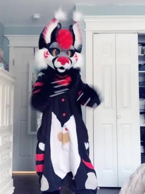 A post by @artemisflame on TikTok caption: I’m so late to this but I just figured out how to do the whole thing #furry #fursuit #furryfandom #foryou #fyp #whatthissays #renegade