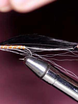 A post by @newenglandstreamers on TikTok caption: Lady Rangeley #myaesthetic #flyfishing #flytying #howidothings #turnitup #fishing #myownvoice #PlayWithLife #hobby #art #fly #tie