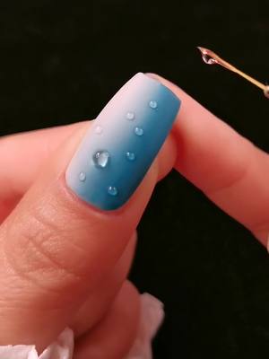 A post by @monica7343 on TikTok caption: Rain drops#nailtech#nailtutorial