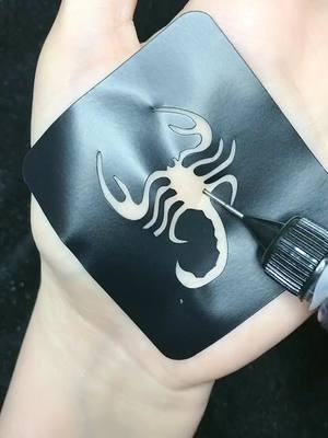 A post by @tattooexpert on TikTok caption: #Waterproof #Temporary #Tattoo #Sticker #customized #FashionableDesign #coolgirl #MakeupAccessories #onlineclass #TheSongOfUs