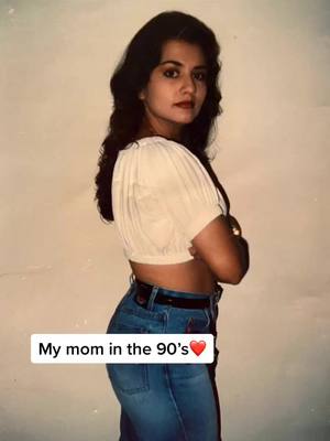 A post by @kikiochoa on TikTok caption: Everyone says I’m my mother’s twin, so I decided to recreate this picture❤️ps. We’re both 24 in the pics #momdaughter #momgoals #foryoupage