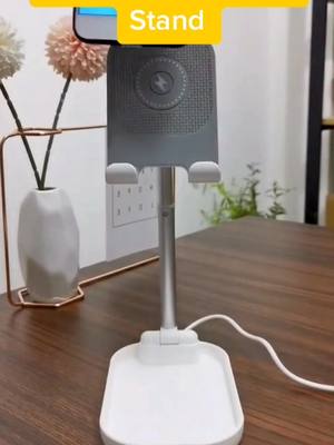 A post by @phone_accessories on TikTok caption: #wirelesscharger #phone #iphone #stand #foru #foryou