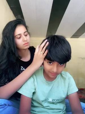 A post by @kinjaldavemusic on TikTok caption: With my cousin ☺️ lockdown me thodi masti 🤣💖