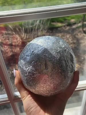 A post by @foil..ball on TikTok caption: Day 6: Making the biggest foil ball on tiktok - If I went live would you watch it? #reynoldswrap #foilball