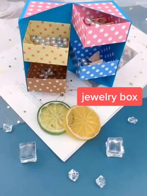 A post by @origamixxx on TikTok caption: Let see if you want this Jewelry box😎#fyp #DIY #promdiy #tutorial #xyzbca #creative #origami #craft #jewelry