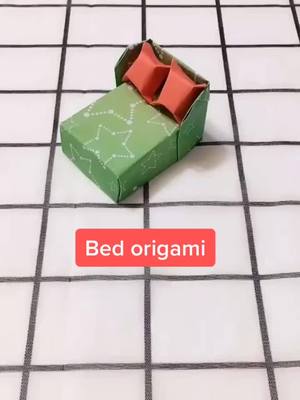 A post by @origamixxx on TikTok caption: My mini bed 🛌 nice #fyp #promdiy #tiktokhot #DIY #foryou #bed #Home #origami #craft