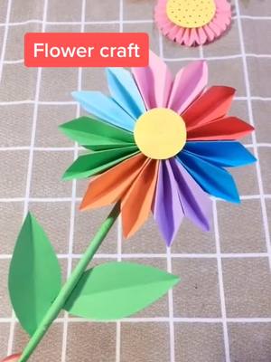 A post by @origamixxx on TikTok caption: Make some flowers 💐 give them to friends or classmates,and your dear teachers when you go back to school 😄#fyp #DIY #craft #flower #friends