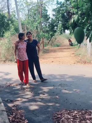 A post by @mangli_singerofficial on TikTok caption: 😍 me & my sis hunting for 🥭