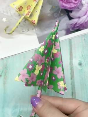 A post by @michellesales02 on TikTok caption: Is it easy for u. 🌂 #foryou #tiktokdiy #MomsofTikTok #origami #craft