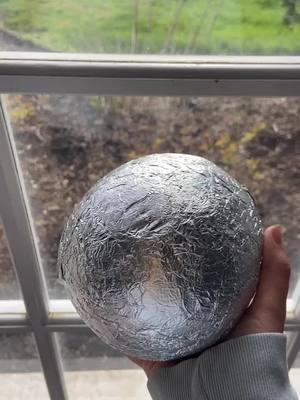 A post by @foil..ball on TikTok caption: Day 7: Making the biggest aluminum foil ball on Tiktok // First 10 people that follow my Instagram @_foil.ball_ get a follow back!