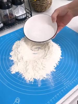 A post by @uncleballon on TikTok caption: comment "yes" if you like it 😂😂 #kneading #dough #mat 😄😄 #goodthing #fyp 🤔🤔