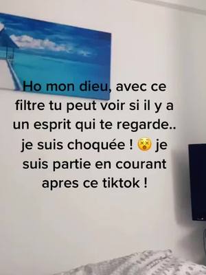 A post by @kamelina17 on TikTok caption: Mon dieu j’ai filmé sa pour rire avant de me coucher j’étais dans mon lit et j’ai flippé ma race 😱 #ghost #strange #spirit