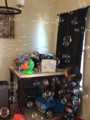 A post by @reynaldocasarez on TikTok caption: My grandson playing with his new bubble machine