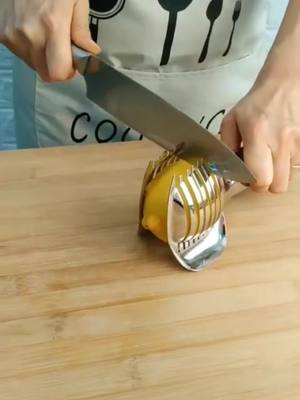 A post by @uncleballon on TikTok caption: comment "yes" if you like it 😛😛 #lemon #tomato #slicer 🤩🤩 #goodthing #fyp 😎😎