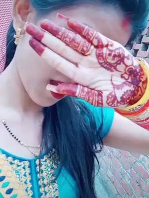 A post by @riyuriyujha on TikTok caption: #hathonmeinmehndi #imnotamodel