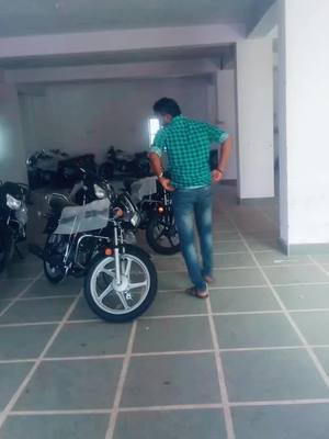 A post by @parhladmahawar1 on TikTok caption: my showroom Raj Motors Tonk राजस्थान Hero MotoCorp