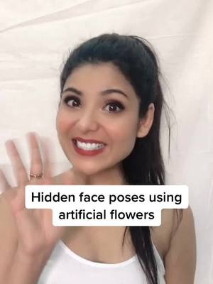 A post by @_niharikajain on TikTok caption: Comment your favourite flowers 😍 #NiKaParivar #howtopose #hiddenface #pose #posetothis