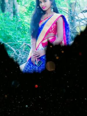 A post by @swaraguddi1 on TikTok caption: #doubleexposure Saree me phool ☺️😘☺️#tiktokindia #foruyou #trending #doubleexposure