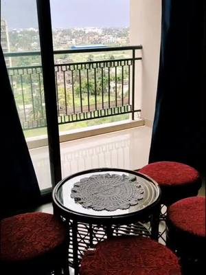 A post by @potpourrivlogs on TikTok caption: Good Morning Tiktok family! Have a great Sunday! #monsoonvibes #rainyday #hindisong #beautifulview #romantic #weekend #balcony #weather