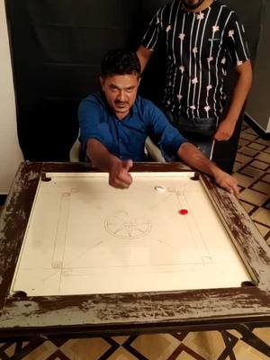 A post by @smileab0 on TikTok caption: carrom badsha 👑#opanchallenge #TideLagaoDaagHatao #foryou #viralvideio @aslamagariya16 @tiktok_india