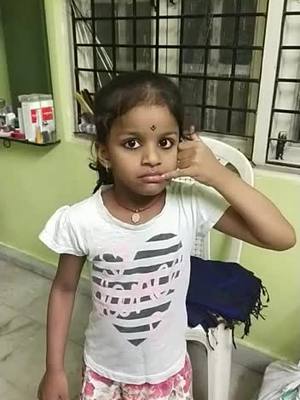 A post by @sneha_mudiraj_20 on TikTok caption: crazy look 😂😂by my cuite 😘😘