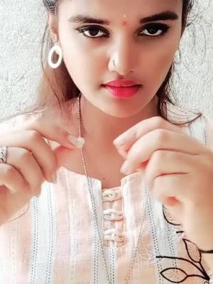 A post by @kavya_gowda_ammu on TikTok caption: 👀👀#foryou #forurpage #tiktockindia #treanding #viralvideo #kannadamusically #kavyagowda