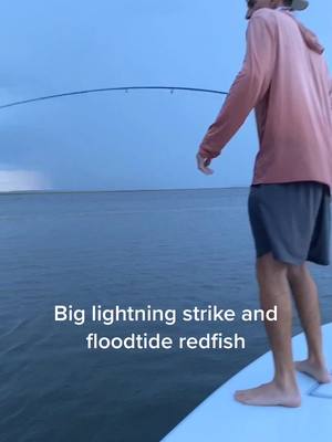 A post by @greggranstad on TikTok caption: Dangerous evening to be floodtide fishing. #fishing #lightning #redfish #flyfishing #floodtide