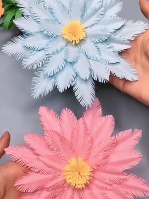 A post by @carlotagreen on TikTok caption: I really really really like this flower 🌸 #makesomeonesmile #DIY #craft #cool #foryou #foryoupage #fyp #diycraft #origami #tutorials