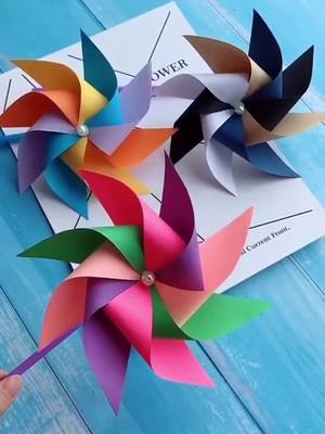 A post by @carlotagreen on TikTok caption: Do you still remember how to make the paper windmill?#summer2020 #cool #DIY #foryou #foryoupage #fyp #diycraft #tutorials #origami