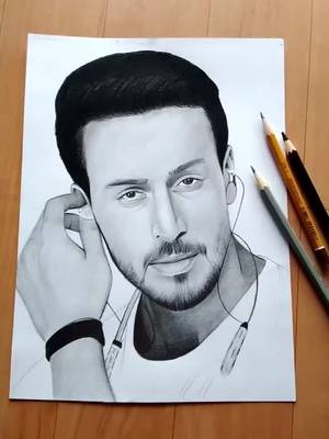 A post by @choudhary_nishu01 on TikTok caption: Sketch for @tigershroff 🌹❤#foryou #foryoupage #trending #tiktokindia #choudhary_nishu01 @tiktok_india