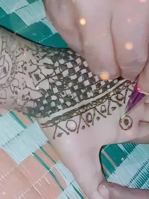 A post by @sweet_arsh7890 on TikTok caption: #TikTokTaughtMe mehandi first time he is putting in my hand when I was forces