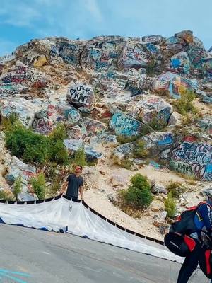 A post by @imagevibe on TikTok caption: Close call 😮😅#paragliding #vibe #naure #parachute #mountain #firsttime #adventure #happy #sunday #scary #image #northcarolina #bellmountain