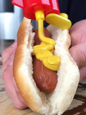 A post by @hygoshop on TikTok caption: A fun way to serve toppings 🙌 #fyp #toppinggun #foryoupage #hotdog #food #Foodie #viral #fy