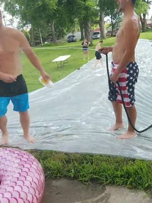 A post by @zoeymcintire on TikTok caption: When parents have a night without kids... #slipnslide #iowa #foryoupage #fyp @graham2525 @shellbz1810