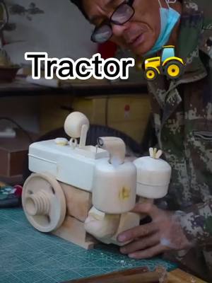 A post by @clarkcaptain on TikTok caption: how to make the tractor 🚜? Here the tutorial for u 😎😎. #woodworking #creative