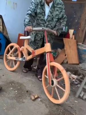 A post by @clarkcaptain on TikTok caption: Where do u want to go by this bike 🚲 🚲?? #woodworking #creative see me more