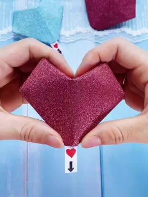 A post by @d_handmade.pro on TikTok caption: #paperheart #paperfold #DIY #origami #foryou