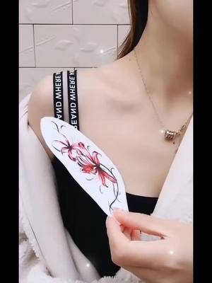 A post by @tattooshopno1 on TikTok caption: Suit #fyp #tattoo