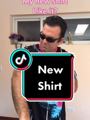 A post by @joeanelli on TikTok caption: New Shirt 👕 Like It? #waitaminute #flowershirt #shoulderdance #joeanelli