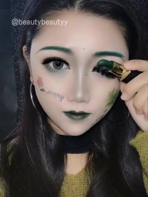 A post by @beautybeautyy on TikTok caption: Reply to @oyku92 make up with green lipstick！#lipstickchallenge #cosmetics #summerlook #fyp #lipstick  #beautybeautyy #makeup #makeuptutorial