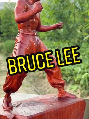 A post by @woodworking1985 on TikTok caption: Time named Lee one of the 100most important people of the 20th century🔥🔥🔥. #brucelee #kongfu #wood #woodworking #art #actor #director#artist #tik