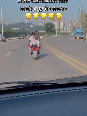 A post by @oldsportman on TikTok caption: lolllll，how the driver see what she do#funnyvideos #driving#CanYouWorkIt